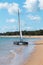 A catamaran is launched before a sailing class