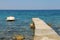 Catamaran near the pier on the coast of the Tyrrhenian Sea, Elba