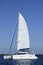 Catamaran sailboat sailing blue ocean water