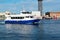 Catamaran sails to the port of Barcelona, Spain - May 13, 2018