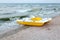 A catamaran standing on a beach with roof Evening time No people