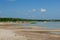 Catamarans on the beach. Bright colorful pedal boats at the sea beach. Water transport for fun. Water slide