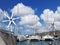 Catamarans and sailboats in the French West Indies marina. Marina in the caribbean under tropical blue sky. Close up of