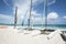 Catamarans on tropical beach.