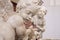 CATANIA, ITALY - APRIL 7, 2018: The angels and baroque marble stoup in Chiesa di San Nicolo