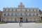 CATANIA, SICILY - JUNE 19, 2019: historical building of the oldest University in Sicily, with people walking in the place. Its