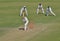 Catch Attempt by Wicket Keeper During a Cricket Match