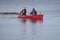 Catching a Small Mouth Bass from a Red Canoe on Georgian Bay