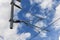 Catenary support with clouds o blue sky