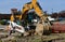 Caterpillar excavator and Bobcat skid steer