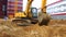 Caterpillar excavator working on construction site. Earthmoving process