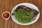 Catfish grilled with boiled neem leaf