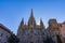 The Cathedral of Barcelona, detail of the main facade in typical gothic style with stone friezes and gargoyles. Barri Gotic,