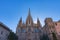 The Cathedral of Barcelona, detail of the main facade in typical gothic style with stone friezes and gargoyles. Barri Gotic,