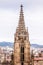 The Cathedral of Barcelona, detail of the main spire in typical gothic style with stone friezes and gargoyles. Barri Gotic,