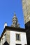 Cathedral: Baroque tower on a house. Funny perspective. Sunny day, blue sky. Santiago de Compostela. Spain.