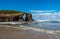 Cathedral beach iconic rocks with hole in Galicia