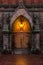 A cathedral door at dusk