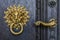 The cathedral door knocker and handle