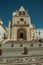 Cathedral facade and old buildings on a deserted square