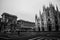 Cathedral of Milan, Italy at sunrise - famous landmark in the city. Black and white