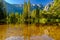 Cathedral Rocks reflecting in Merced River at Yosemite