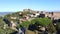 Cathedral of San Salvador in the city landscape. Montalcino, Italy