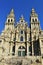 Cathedral, Santiago de Compostela, Obradoiro Square. Spain. Baroque facade, old iron gate and towers. Clean stone, sunny day.