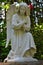Catholic angel statue kneeling and praying.