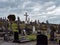 An Catholic cemetery on a cloudy spring day. Stone tombstones. Cemetery of Darrara in Cork County