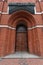 Catholic church of Holy Family in Russia, Kaliningrad city. Neogothic red brick building style. Inscription