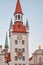 Catholic church with red roofs and emblem of Germany in Munich