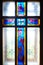 Catholic cross on the window (stained glass)