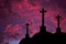 Catholic crosses silhouette with a darkness`s sunset background. We live in dangerous times, this Easter stay home and pray for th