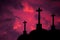 Catholic crosses silhouette with a darkness`s sunset background. We live in dangerous times, this Easter stay home and pray for th