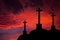 Catholic crosses silhouette with a darkness`s sunset background. We live in dangerous times, this Easter stay home and pray for th