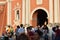 Catholic devotees coming out from cathedral portal during Good Friday, as part of Holy Week celebrations