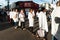 Catholic faithful parade in line and in silence during the procession of the Passion of Christ