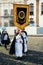 Catholic faithful walk the streets of Pelourinho with banners du