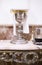 Catholic liturgical chalice, wine pitcher and bell