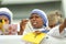 Catholic nuns sing, hold rosaries and Vatican flags while waiting for Pope Francis to come in his first visit in Romania