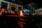 Catholic priest is celebrating night mass around the holy bonfire on hallelujah saturday night. Holy week in Valenca, Bahia