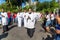 Catholic priests and faithful are seen during the Palm Sunday procession