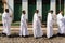 Catholic priests participate in the corpus christi procession in the streets of Pelourinho, Salvador, Bahia