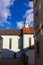 catholich church with blue yellow facade on blue sky