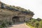 Cattle in cave next to road to Witsieshoek Mountain Resort