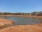 Cattle dam in outback Australia with water in the desert