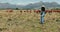 Cattle, farm and woman walk with cows in countryside, grass field or sustainable agriculture and land. Farmer, animal