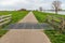 Cattle grid in a narrow cycle and walking path along a river in the Netherlands