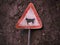 Cattle warning symbol / sign post